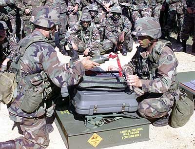 Soldiers_assembling_an_Anti-Personnel_Obstacle_Breaching_System.jpg