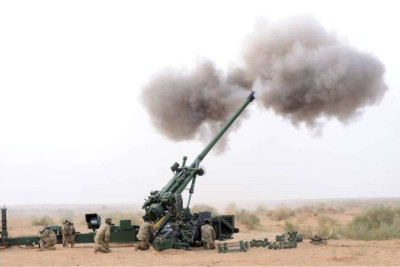 Trajan_155mm_52_caliber_towed_gun_howitzer_Nexter_Systems_KNDS_France_925_001-b4ba6d79.jpeg
