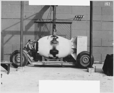 FM_(Fat_Man)_unit_being_placed_on_trailer_cradle_in_front_of_Assembly_Building_^2_-_NARA_-_519397.tif.jpg